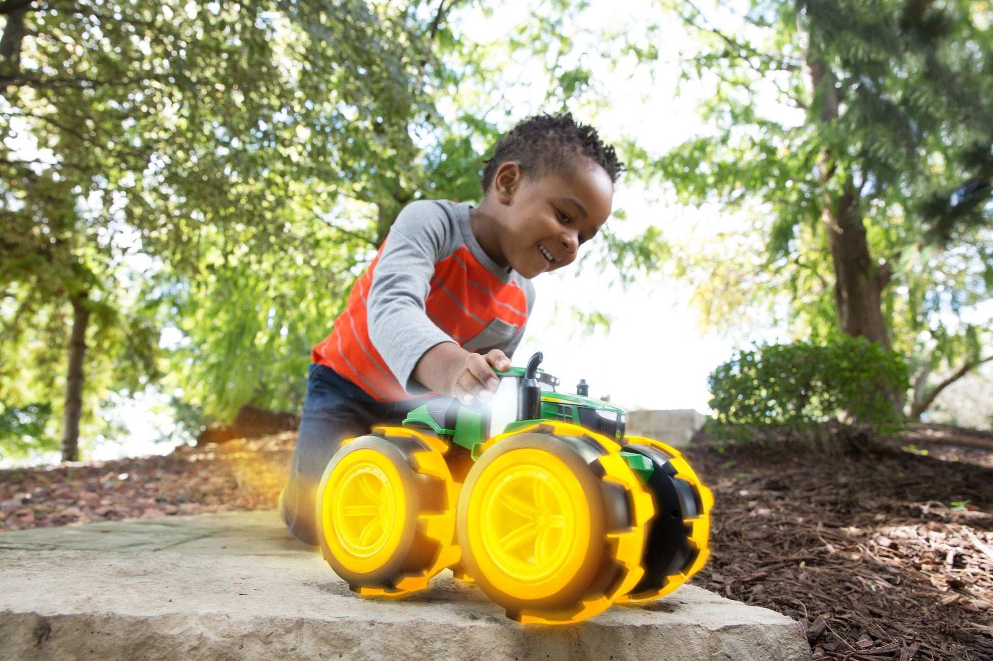 TOMY Monster Treads Lightning Wheels - Deluxe Rainbow Tractor - John Deere Tractor Toys - Light Up Monster Truck Toy with Rainbow Lights and Sounds