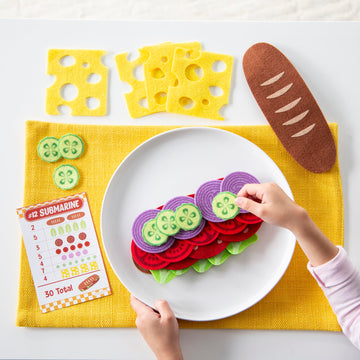 Peaceable Kingdom Math Sandwich Game: Preschool Math Games for Kids Ages 3 and Up - Includes 100+ Felt Food Pieces, 10 Menu Cards, Dry Erase Marker