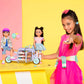 Glitter Girls - 14-Inch Fashion Doll - Brown Hair & Purple - Blue Eyes - Poseable Arms & Legs - Ruffle Outfit & Hair Bow - 3+ Years- Candice
