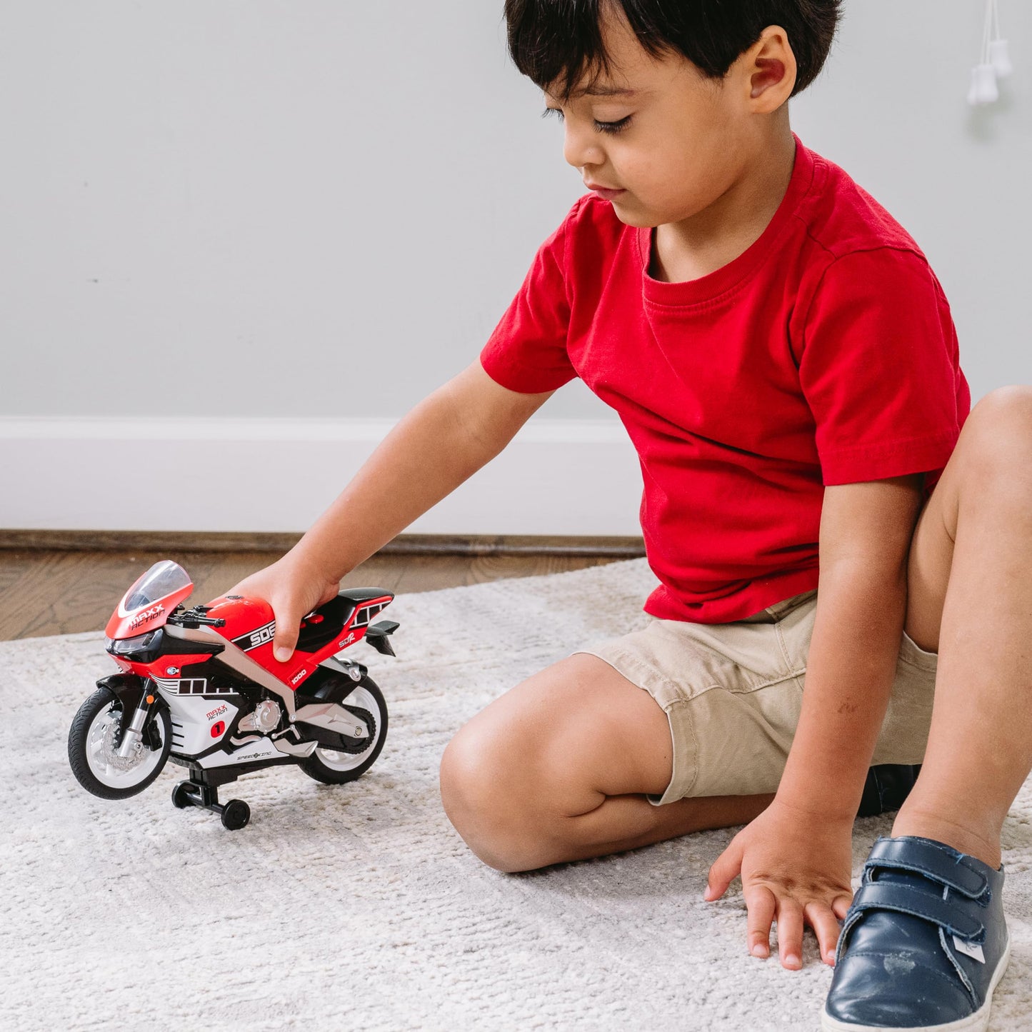 Sunny Days Entertainment Maxx Action Super Bike with Wheelie Feature - Red Motorized Toy Motorcycle for Boys & Girls | Light & Sound Vehicle for Kids