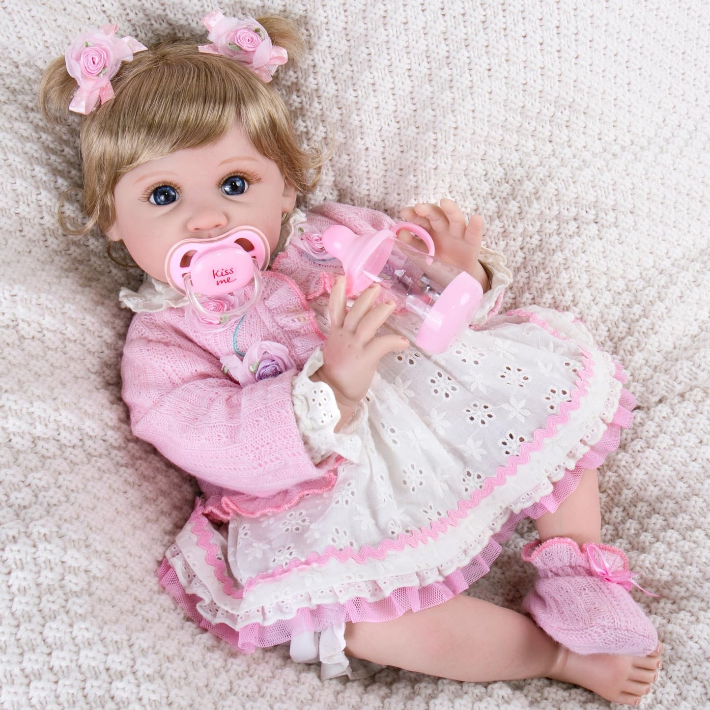 Aori Reborn Baby Dolls 22 Inch - Realistic Baby Doll for Kids 3+ Years - Lifelike Newborn Baby Girl with Pink Outfit - Handmade Cloth Body Reborn