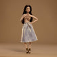 Barbie Basics Model Collector Fashion Doll 06 with Brunette Hair, Shimmery Golden Skirt & Halter, Universal-fit Fashions, Posable Body