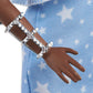 Barbie Fashionistas Doll #146 with 2 Twisted Braids & Prosthetic Leg Wearing Star-Print Dress, White Shoes & Arm Bracelet, Toy for Kids 3 to 8 Years