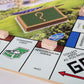 Hasbro Gaming Monopoly: Go Green Edition Board Game | Made with 100% Recycled Paper Parts and Plant-Based Plastic Tokens | Family Board Games | Ages 8