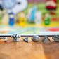 CLUE: Peanuts Board Game, Solve The Mystery of Linus's Missing Blanket with Charlie Brown, Snoopy, & Friends, Explore Iconic Locations Like Lucy’s