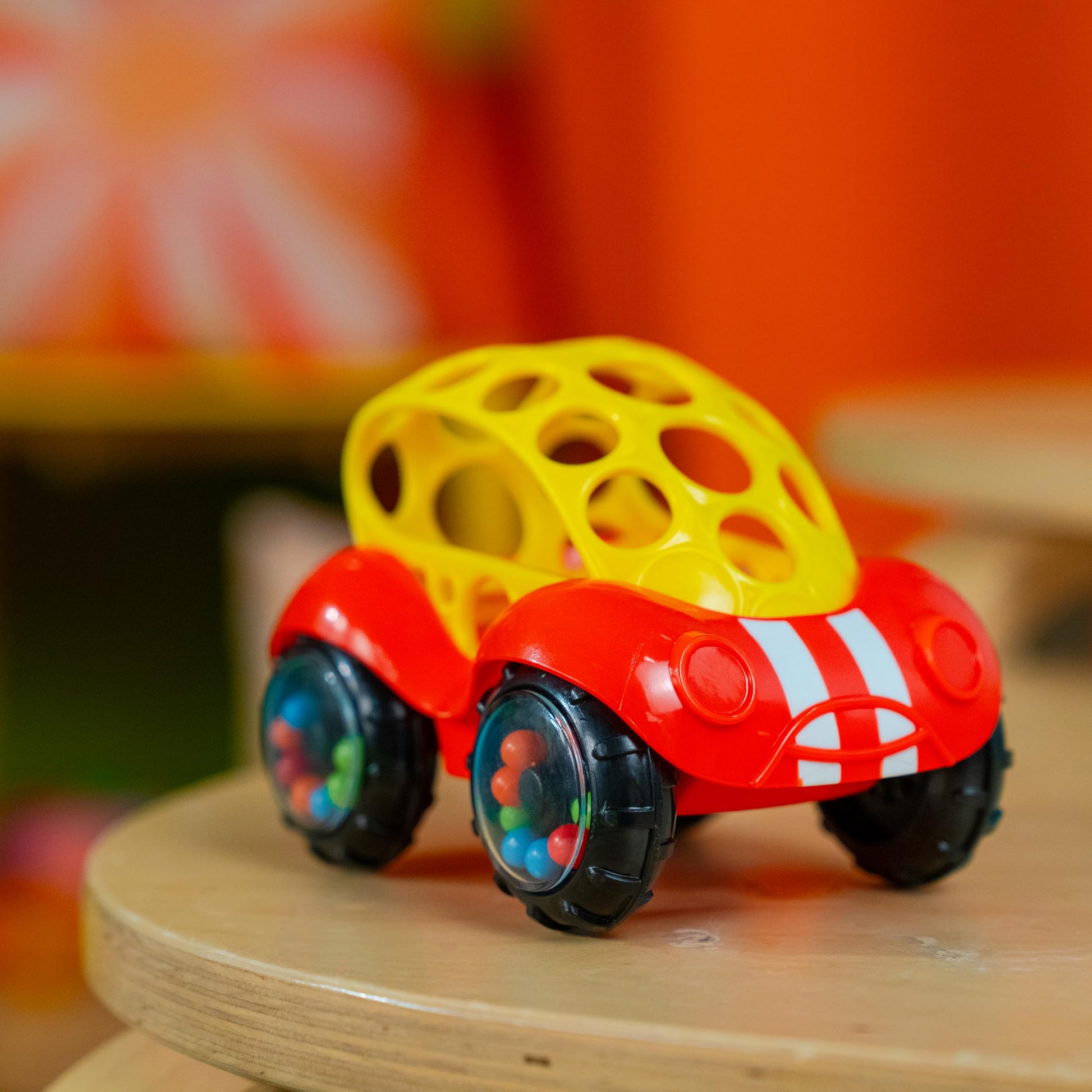 Oball Easy Grasp Rattle & Roll Buggie BPA-Free Push Car Infant Crawling Toy, 1 Pack, Age 3 Months and up, Red/Yellow