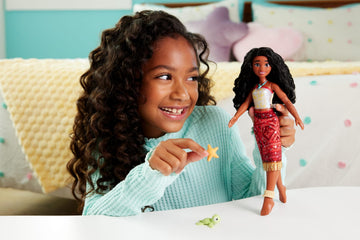 Mattel Disney Moana 2 Toys, Swimming Tautai Moana Fashion Doll with 2 Accessories, Color-Change Bodice & Kicking Legs, Inspired by the Movie