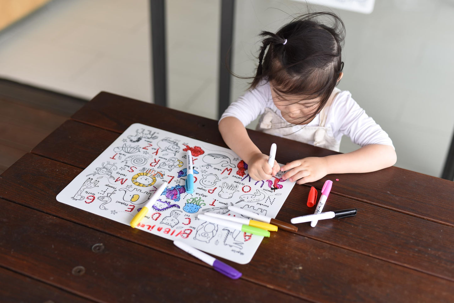 HeyDoodle Into The Wild Classic Doodle Mat - Reusable Silicone Alphabet Coloring Mat for Toddlers and Kids - Educational Animal Activity Pad with 9