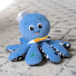 Baby Einstein Octoplush Musical Huggable Stuffed Animal Plush Toy, Learn Colors in 3 Languages, Blue, 11" Age 3 Month and up,