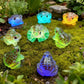 FWKAILEPING 50 Piece Mini Glow in The Dark Resin Frog Set 10 Color Night Light Frogs for Moss Landscape Fairy Garden Dollhouse DIY Eco Bottle Craft