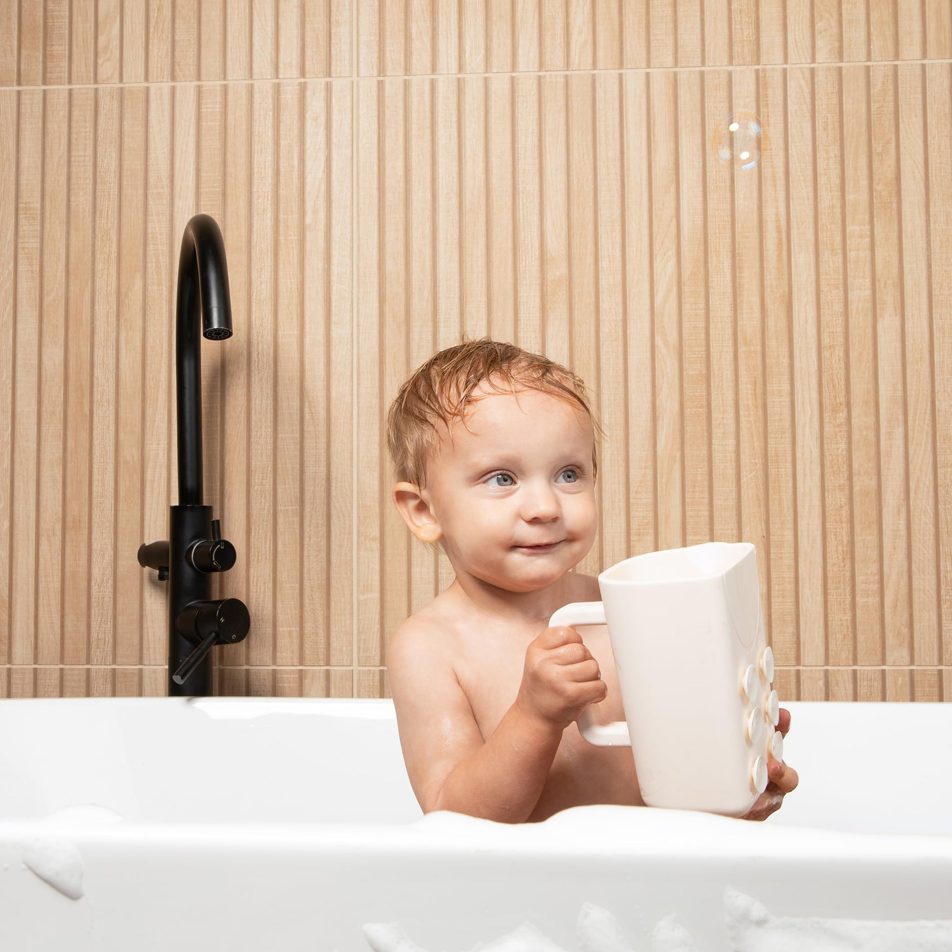 Rinzee® Baby Bath Rinse Cup with Suctions - Soft Silicone Shampoo Rinser for Kids - BPA?Free, Drains Upside Down, Sticks to Tiles. Patent Pending