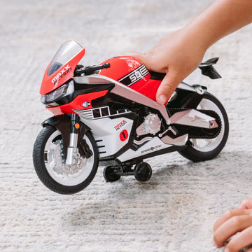 Sunny Days Entertainment Maxx Action Super Bike with Wheelie Feature - Red Motorized Toy Motorcycle for Boys & Girls | Light & Sound Vehicle for Kids