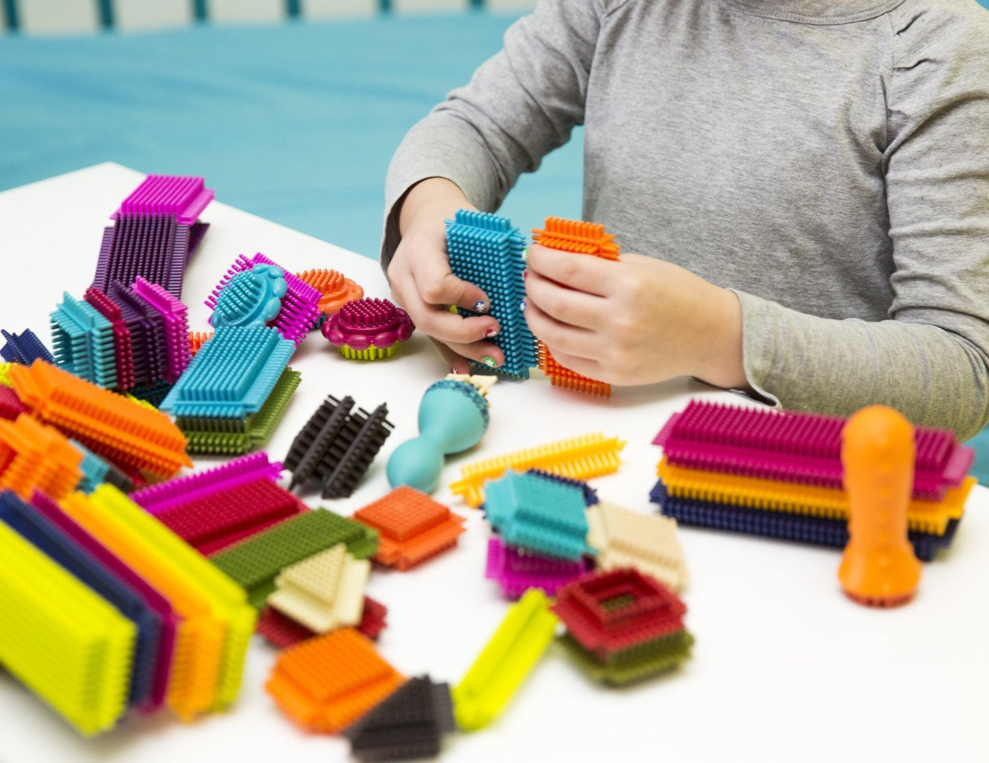 B. toys - Bristle Block - Stackadoos - Sort & Stack STEM Building Blocks Set - 68 Interlocking Blocks - Toys for Toddlers, Kids - Storage Jar with Lid
