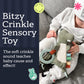 Itzy Ritzy - Bitzy Crinkle Sensory Toy Dinosaur with Crinkle Sound for Babies & Toddlers - Features Soft Braided Teething Ring & Textured Ribbons