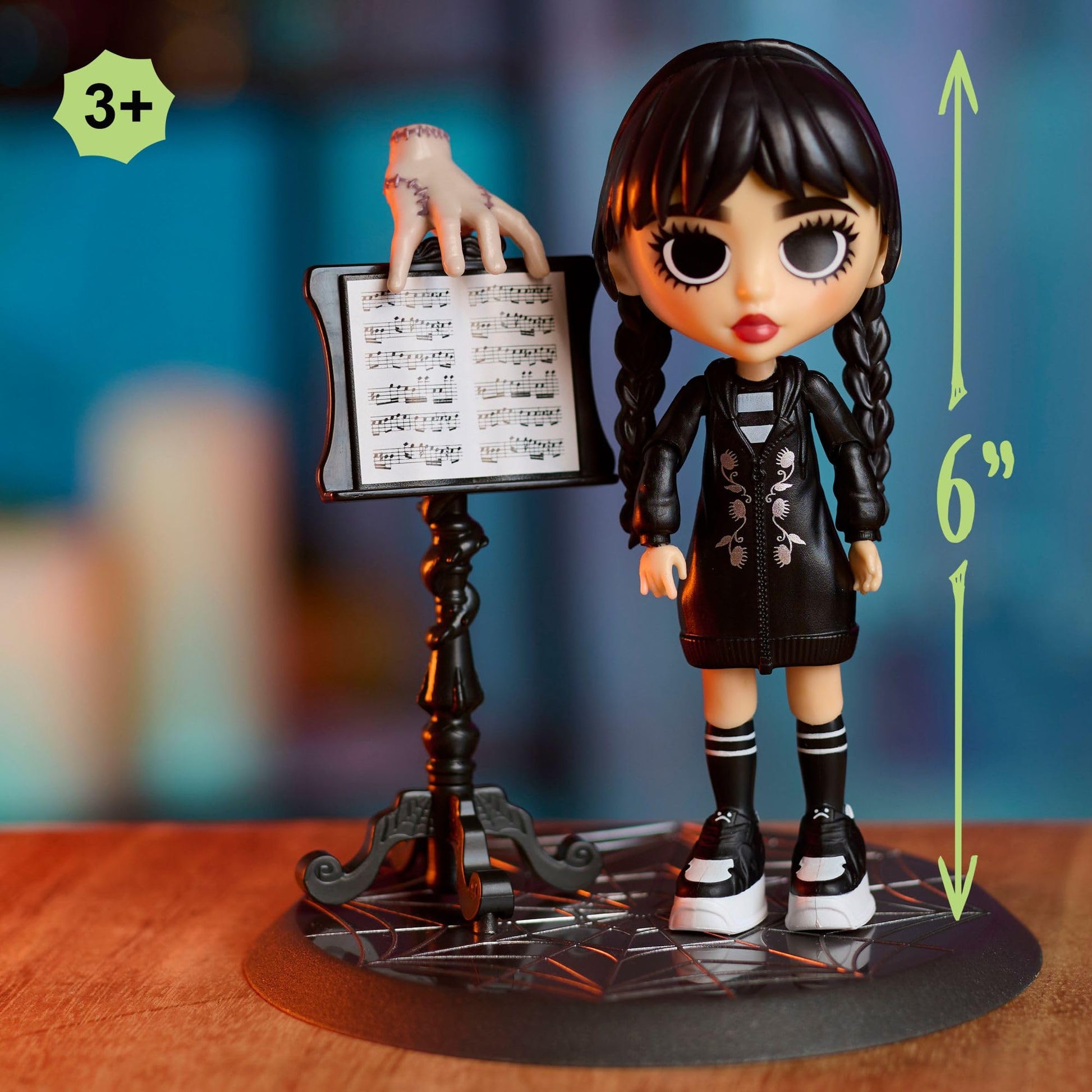 WEDNESDAY Deluxe 6-inch Articulated Figure, 11-Pieces, Interchangeable Face Plates and Fashion, Customizable Collectible Figurine, Kids Toys for Ages