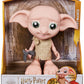 Wizarding World - 8.5" Harry Potter Elf Dobby Interactive Doll with Stocking and 30+ Sounds and Phrases - Harry Potter Gifts - Toys Kids 6+