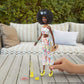 Barbie Storytelling Fashion Pack of Doll Clothes Inspired by Roxy: Matching Floral Top & Pants with 7 Accessories Dolls Including Pineapple Purse