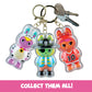 ORB Cuties Keychain Charms Assorted Blind Box Series 2-1 Individual Bubble Keychain Toy - Collectible Themed Animal Figure Charms for Backpacks, Keys