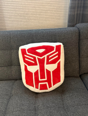 Symbiote Studios Transformers - Autobot Logo Plush Cushion - Officially Licensed Product, Soft and Cuddly Collectible for Fans and Collectors - Ideal