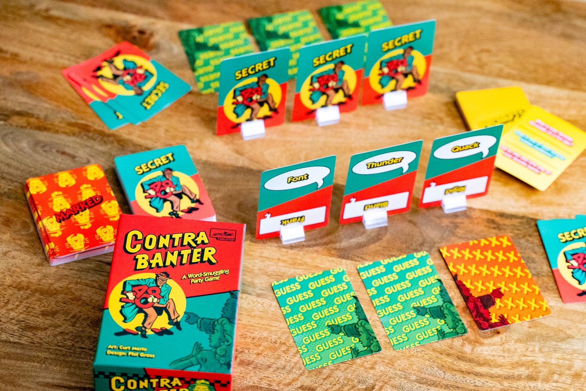 Skybound Games Contrabanter - The Ultimate Word-Smuggling Party Card Board Game for 2 to 15 Players Ages 10+ - Fun Fast-Paced Team-Based Deduction