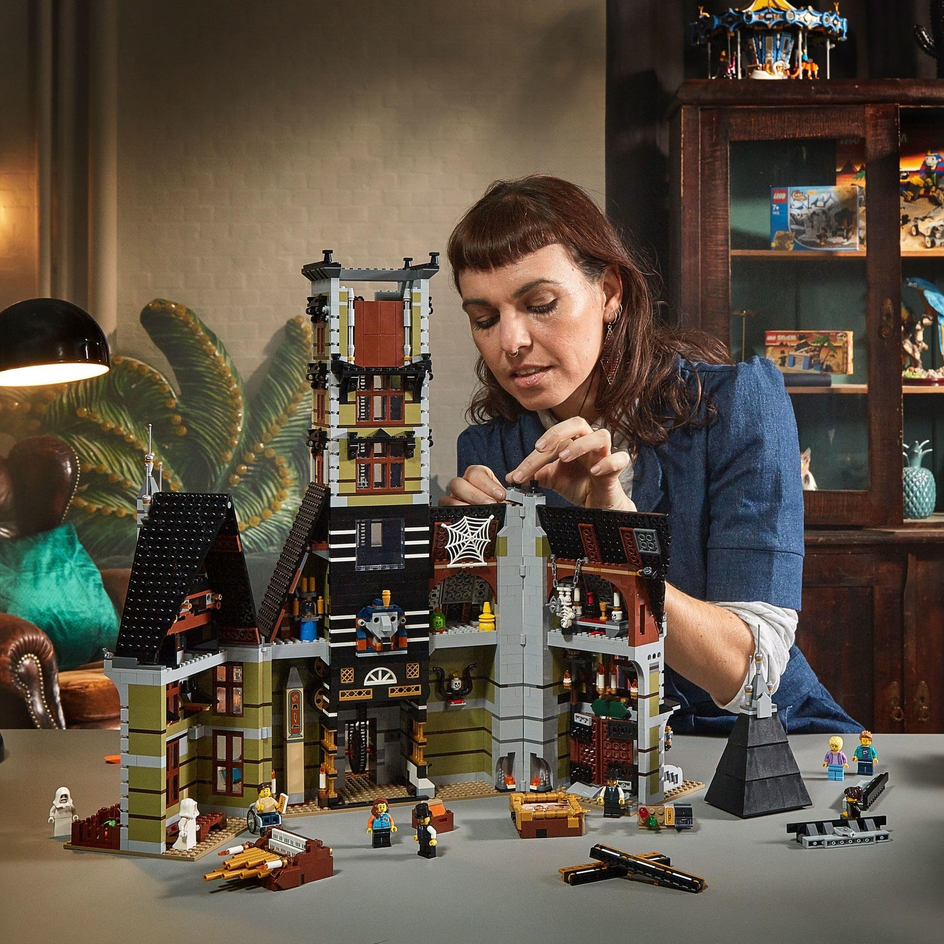 LEGO Icons Haunted House Building Set, Creative Craft for Adults and Family, Haunted House DIY Project to Build Together, Includes 10 Minifigures,
