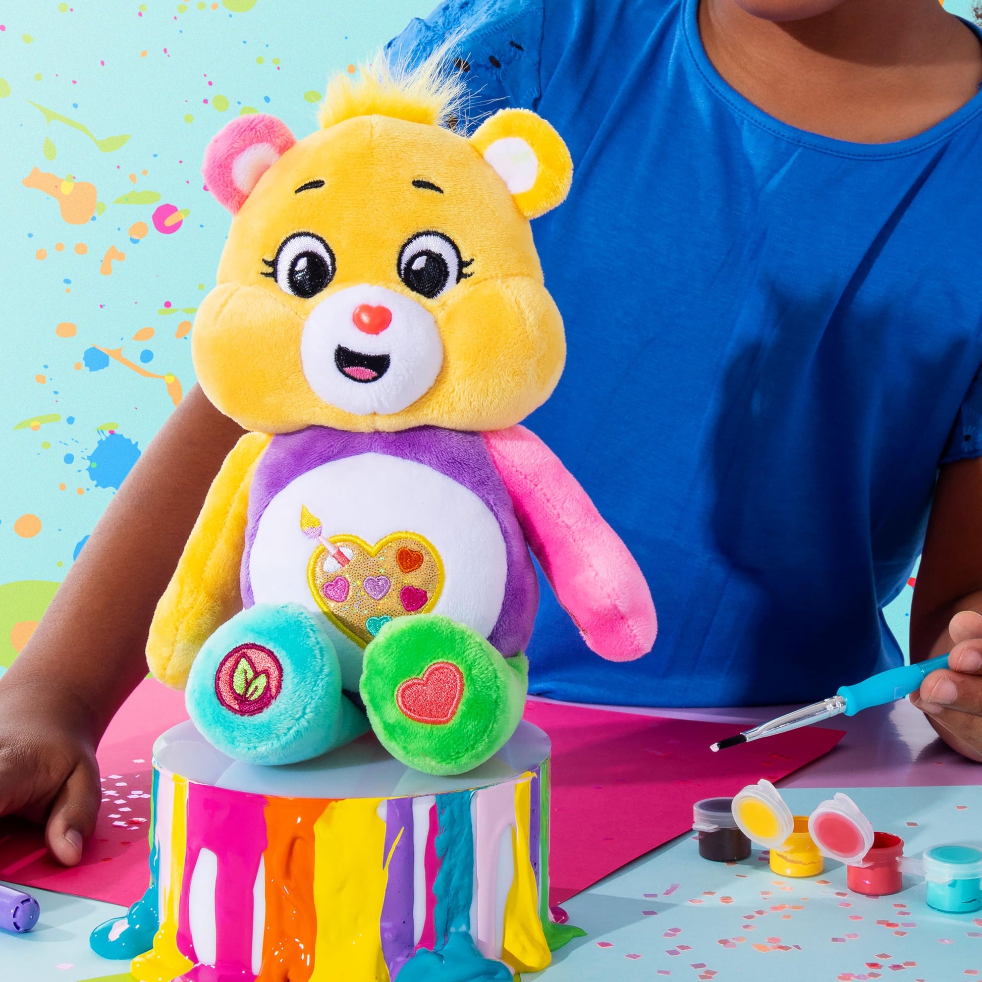 Basic Fun Care Bears 22 cm Glitter Plush - Artwork Bear Environmentally Friendly Cuddly Toy with Glitter Belly Badge - Collector's Plush for Children