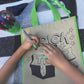 Fun Express 12 - Color Your Own Halloween Craft Tote Bag - Crafts for Kids and Fun Home Activities - Reusable Treat Bags Halloween Party Crafts Favor