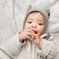 Itzy Ritzy Silicone Teensy Teether - Flexible, Soft & Hollow Baby Teething Toy with Easy-to-Hold Handle - Designed for Ages 3 Months and Up (Hero Pop)