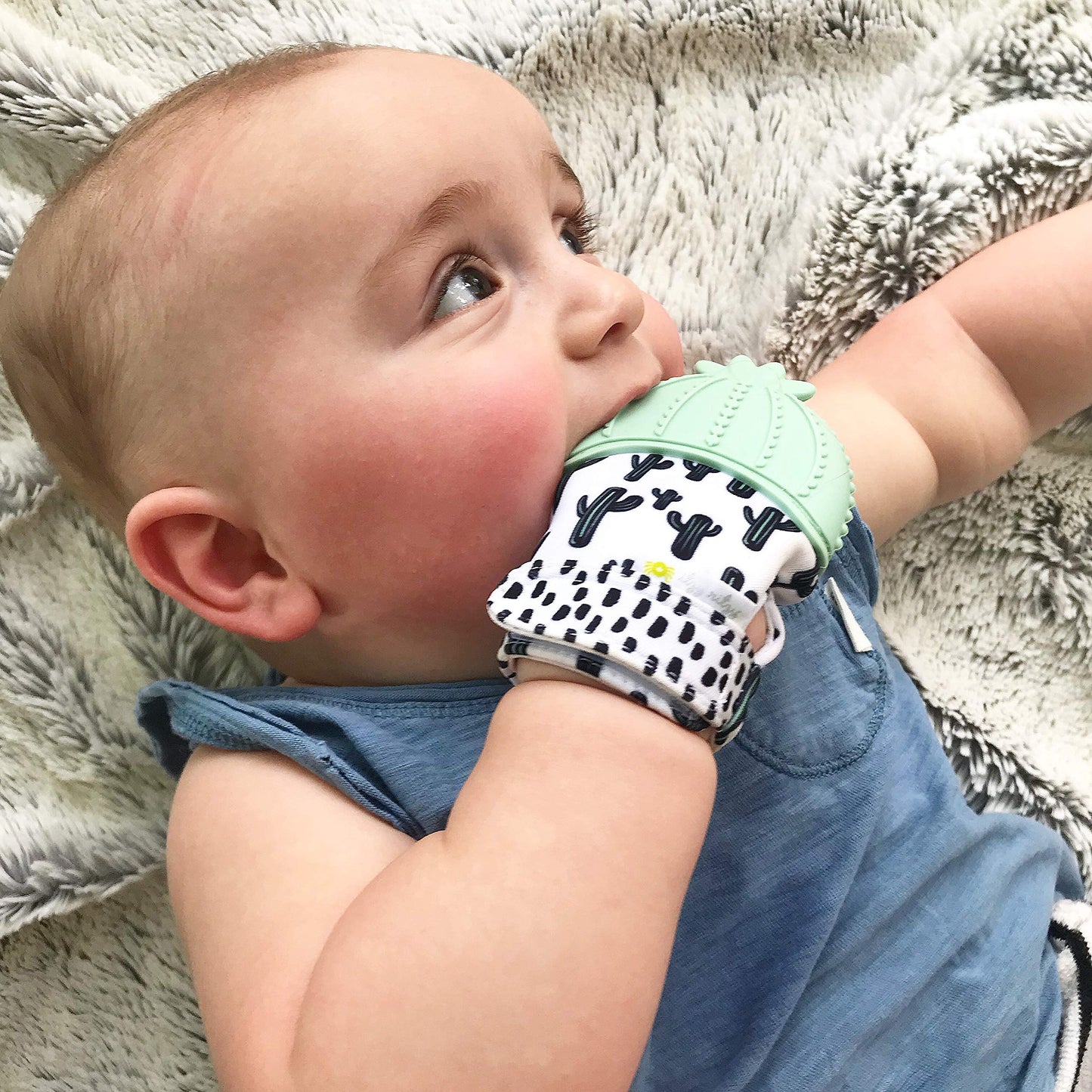 Itzy Ritzy Silicone Teething Mitt - Soothing Infant Teething Mitten with Adjustable Strap, Crinkle Sound & Textured Silicone to Soothe Sore & Swollen