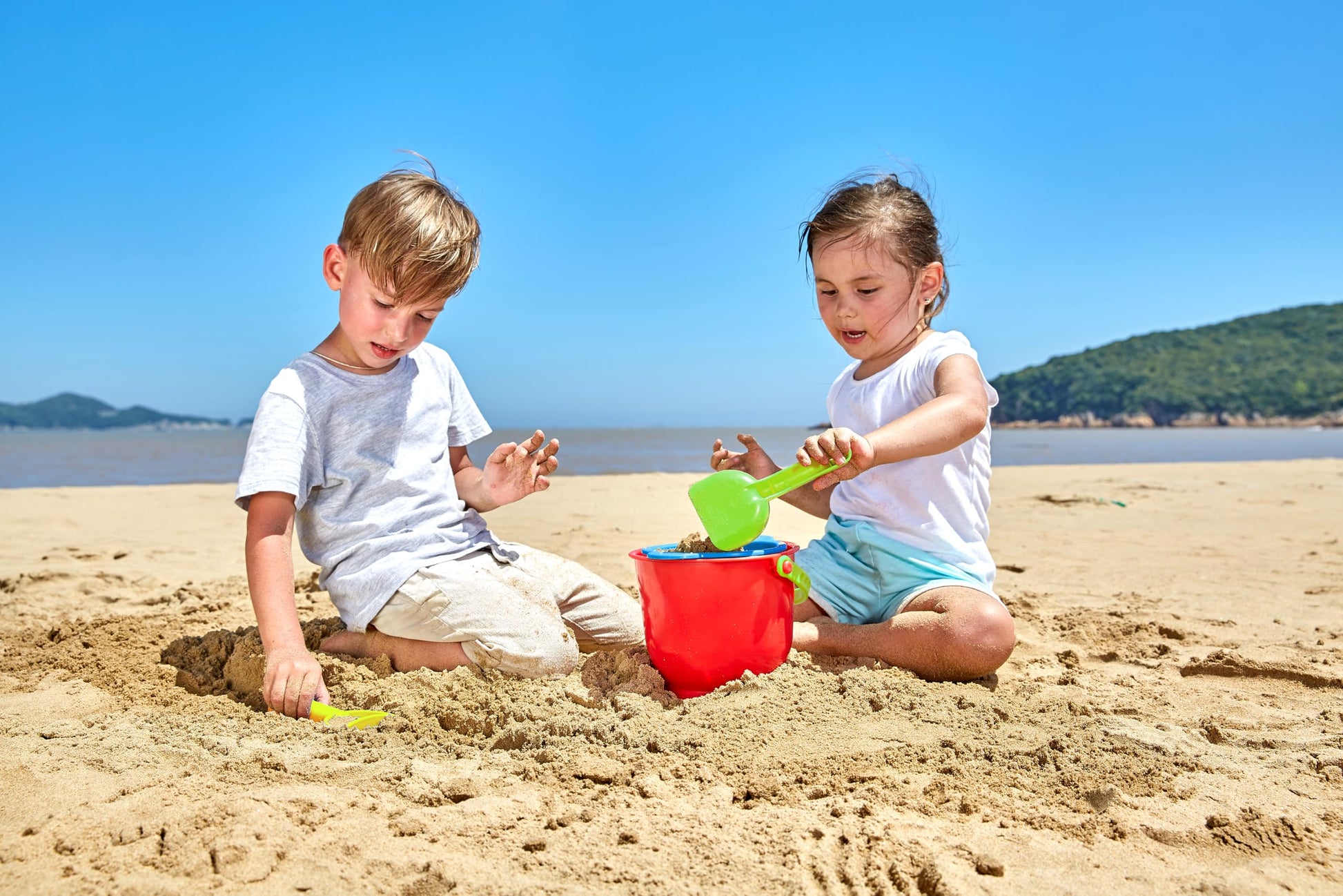 Hape Beach Basics Sand Toy Set Including Bucket Sifter, Rake, and Shovel Toys| Sand Toy Playset for Toddlers 18M+
