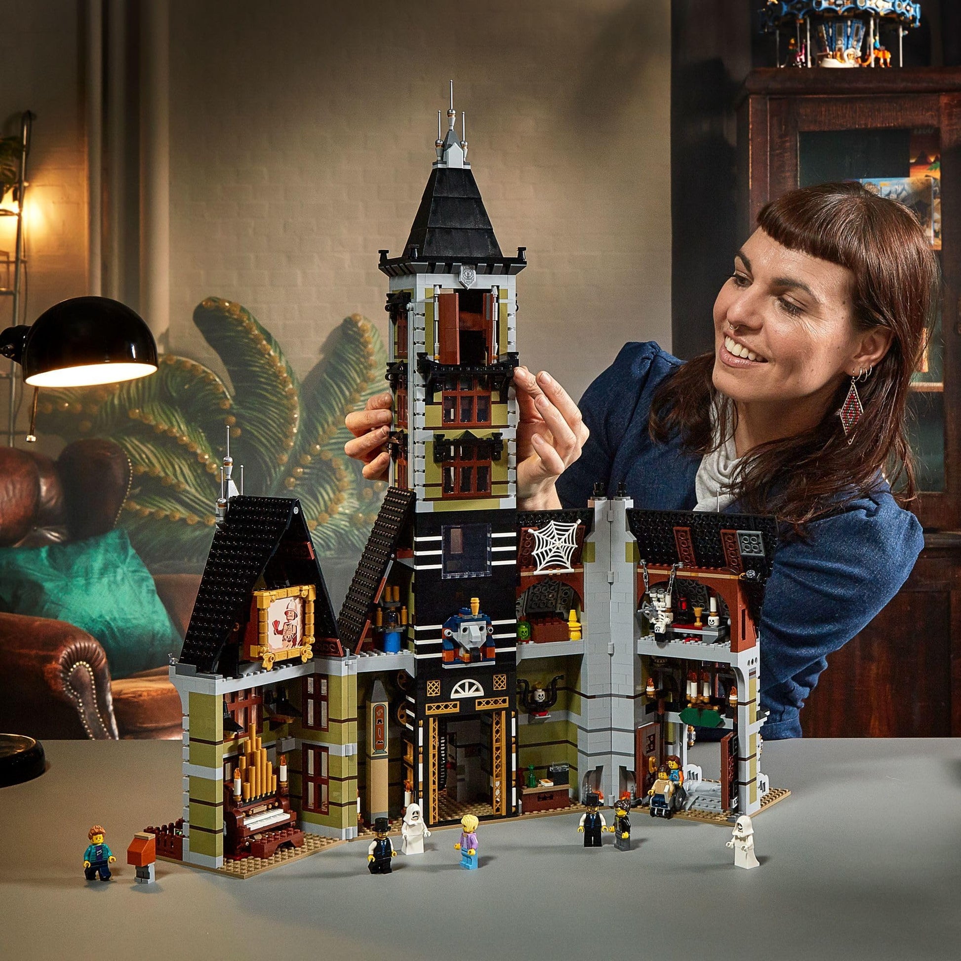 LEGO Icons Haunted House Building Set, Creative Craft for Adults and Family, Haunted House DIY Project to Build Together, Includes 10 Minifigures,