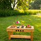 Noble Toys XL Cedar Outdoor Mud Kitchen Centered with Stovetop for Toddlers and Kids | Pretend Play Toddler Table | Sensory Table | Outside Playset |