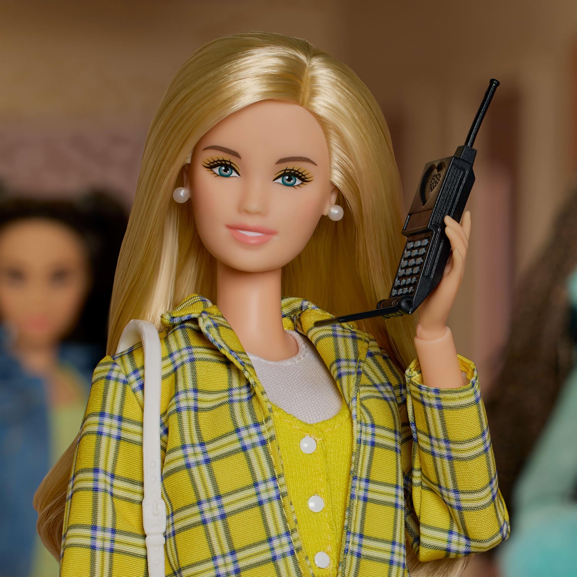 Barbie Signature Doll, Clueless Cher Collectible in Yellow Plaid Suit with Backpack, Cell Phone, & Learner’s Permit Accessories