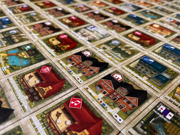 Stonemaier Games: Between Two Cities Essential Edition by Matthew O'Malley & Ben Rosset | Build Cities Cooperatively with Your Neighbors | Strategy