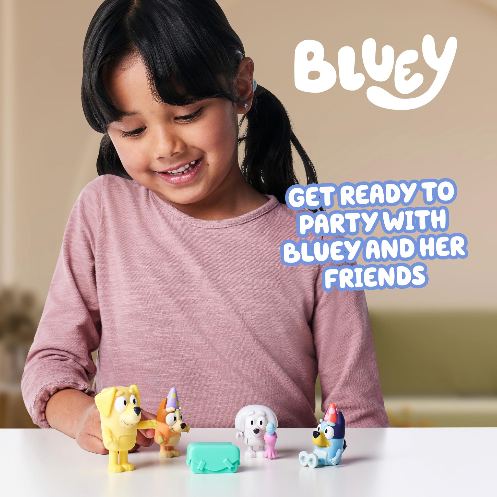 Bluey Pass The Parcel Figurine Toys Pack of 4, Character Toys with Bingo, Lucky’s Dad, and Lila Figures, Small Action Figures for Kids Ages 3+