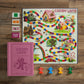 Candy Land Vintage Bookshelf Edition by WS Game Company, Classic Board Games for Kids with Linen-Wrapped Book Box, 1978 Retro Graphics & Slipcase