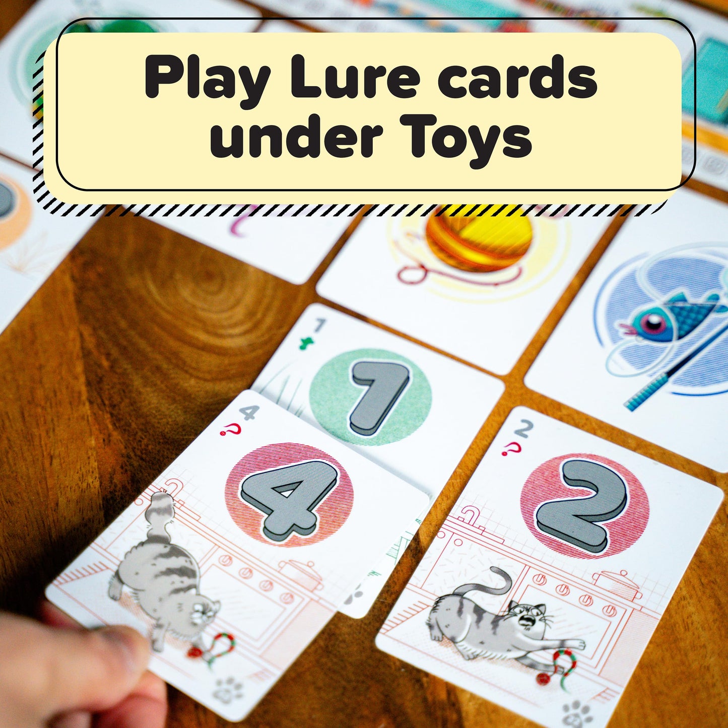 Cat Between Us, A Quirky Fun Strategic Card Game of Attracting a Playful Cat with Toys, Easy to Learn, Unexpected Deep Strategy, Quick Play for 2-6