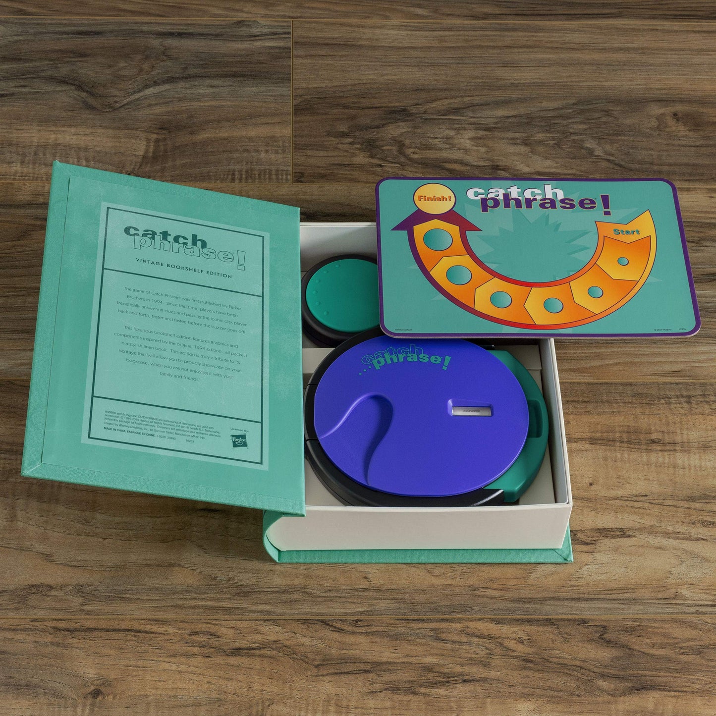 WS Game Company Catch Phrase Game Vintage Bookshelf Edition in Linen-Wrapped Book Case - Electronic Timer & 16 Double-Sided Disks Featuring 2,300+